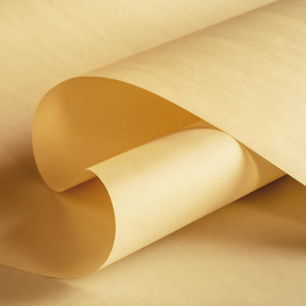 Various kraft paper products including envelopes, cups, and utensils