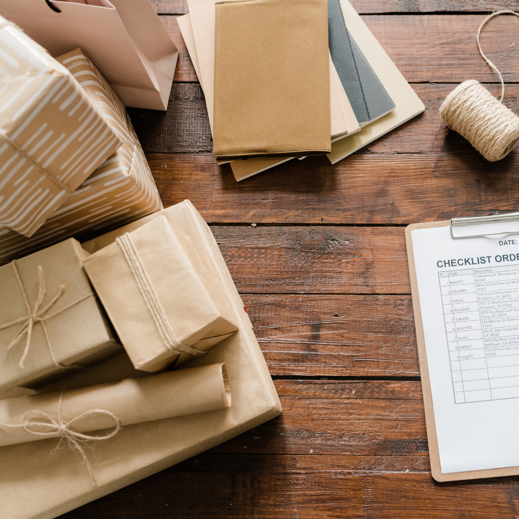 Various kraft paper products including envelopes, cups, and utensils